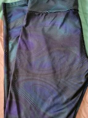 BENCH- Holographic Wave Print Midi Skirt in Purple & Black.